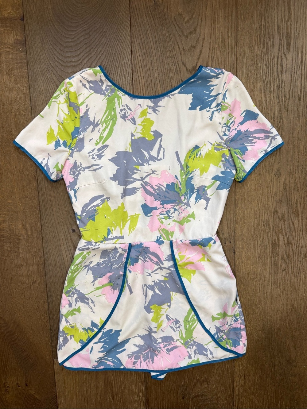 Adelyn Rae Pastel Abstract Floral Short Sleeve Open Back Mini Skort Dress/Romper